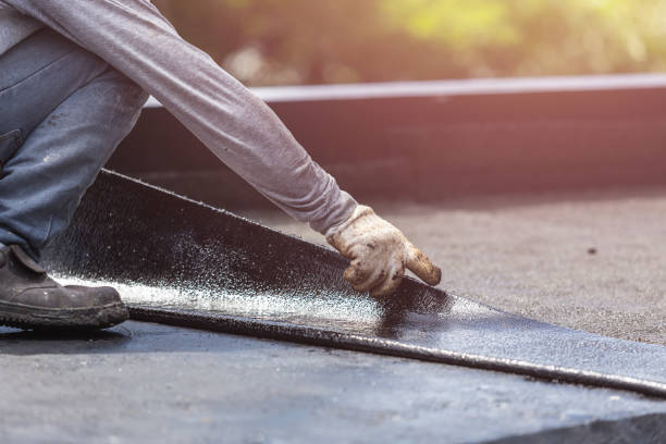 Professional Basement Waterproofing technician working in Charlottesville, IN